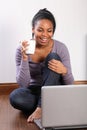 Young student girl at home using laptop online Royalty Free Stock Photo