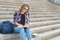 Young student girl making notes in notebook Royalty Free Stock Photo