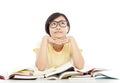 Young student girl thinking with book over white background Royalty Free Stock Photo