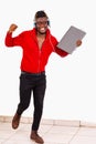 Portrait of a happy young student studying laptop Royalty Free Stock Photo