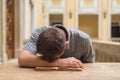 Young student guy studying a boring subject Royalty Free Stock Photo