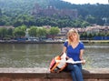 Young student in Heidelberg reading a book Royalty Free Stock Photo