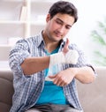 Young student man with injury at home Royalty Free Stock Photo