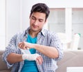 Young student man with injury at home Royalty Free Stock Photo