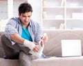 Young student man with injury at home Royalty Free Stock Photo