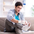 Young student man with injury at home Royalty Free Stock Photo