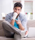 Young student man with injury at home Royalty Free Stock Photo