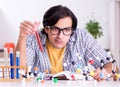 Young student physicist preparing for exam at home