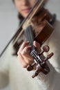 Young student violinist practice at home