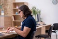 Young male student preparing for exams in the classroom Royalty Free Stock Photo