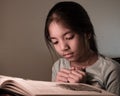 Young student reading a book. Royalty Free Stock Photo