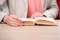 The young student reading book in preparation for exams Royalty Free Stock Photo