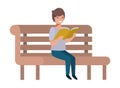Young student sitting reading book Royalty Free Stock Photo