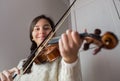 Young student violinist practice at home