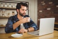 Young student using his laptop Royalty Free Stock Photo