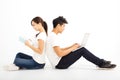 young students couple with laptop and book Royalty Free Stock Photo