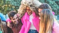 Young students friends having fun outdoor - Happy people after university laughing together - Youth, multiracial and friendship Royalty Free Stock Photo