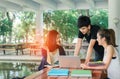 Young Students Group Consult with School Folders,Laptop