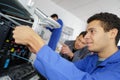 Young students in laboratory using 3d printer Royalty Free Stock Photo