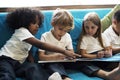 Young Students Reading Children Story Book Royalty Free Stock Photo