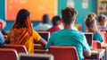 Group of Students Sitting at Desks in a Classroom Royalty Free Stock Photo