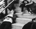 Young students sleeping on the staircase Royalty Free Stock Photo