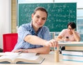 The young students taking the math exam in classroom