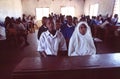 Young students dressed in uniform in a simple classroom near Nairobi Kenya