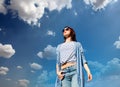 Young style redhead girl in modern clothes