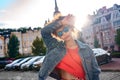 Outdoors Leisure. Young stylish african girl in denim jacket and sunglasses standing in sunlight touching head posing Royalty Free Stock Photo