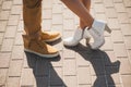 Young stylish fashion couple posing in city street Royalty Free Stock Photo