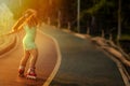 Young stylish girl, roller skates and dancing during sunset Royalty Free Stock Photo
