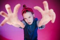 Young stylish girl in the Studio on a colored neon background. Music dj poster design. Portrait of a young girl dancer.