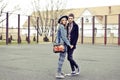 Young stylish hipsters couple outdoor fashion portrait