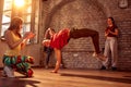 Stylish male break dancer performing moves Royalty Free Stock Photo