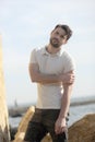 Young stylish man dressed in polo shirt, summer portrait outdoor Royalty Free Stock Photo