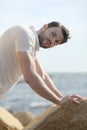 Young stylish man portrait dressed in white polo shirt Royalty Free Stock Photo