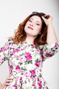 Young stylish red-haired woman with curly hair and pretty face posing in sunglasses. expresses different emotions Royalty Free Stock Photo