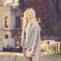 Young stylish woman walking on the city street