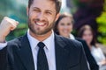 Young Successful Business Man Celebrating With Diverse Team Royalty Free Stock Photo