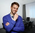 Young successful business man at office. Royalty Free Stock Photo