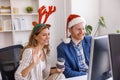 Business people having online meeting while working at the office during Christmas Royalty Free Stock Photo