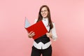 Young successful business woman in glasses holding red folder for papers document and showing thumb up on pink Royalty Free Stock Photo
