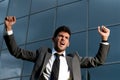 Young successful businessman celebrating a goal Royalty Free Stock Photo