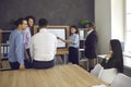 Young successful businesswoman giving presentation in boardroom office Royalty Free Stock Photo