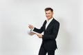 Young successful handsome rich business man in black suit on white background for advertising.