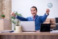 Young successful male employee working in the office Royalty Free Stock Photo