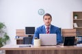 Young successful male employee working in the office Royalty Free Stock Photo