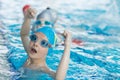 Young and successful swimmers pose