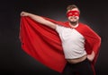 Young super hero man in studio Royalty Free Stock Photo